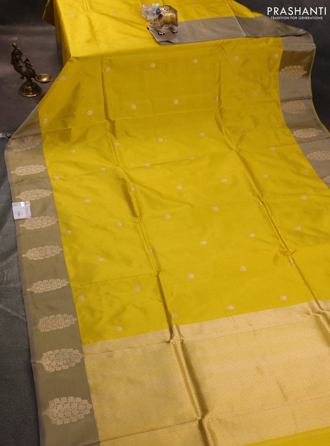 Banarasi katan silk saree yellow and grey shade with zari woven floral buttas and zari woven butta border