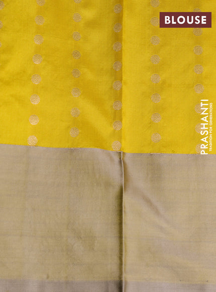 Banarasi katan silk saree yellow and grey shade with zari woven floral buttas and zari woven butta border