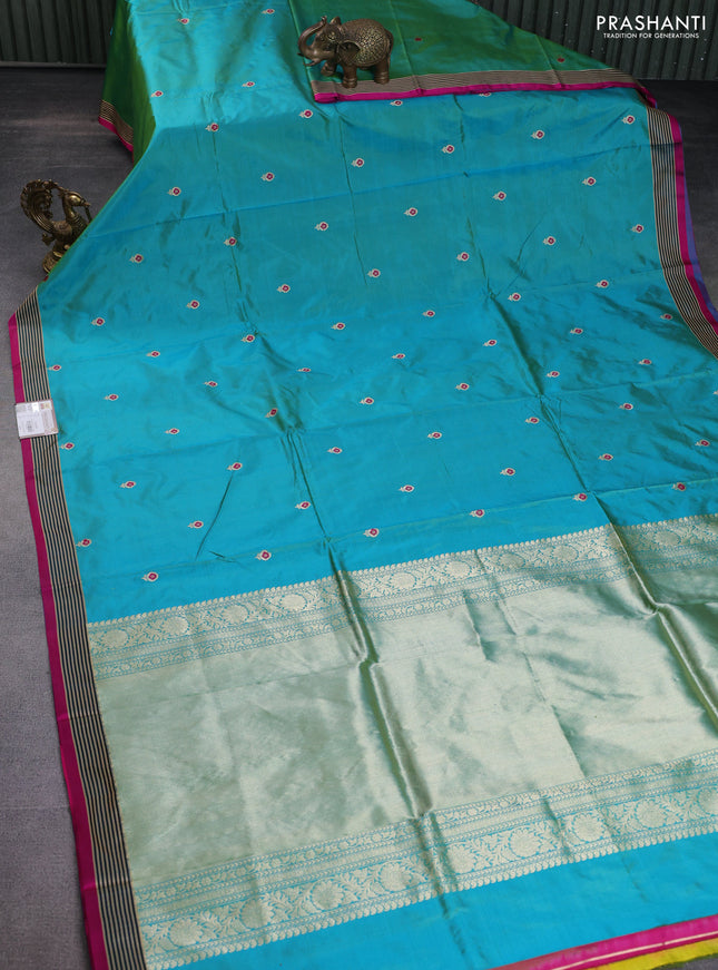 Banarasi katan silk saree dual shade of teal green and pink with zari woven floral buttas and simple border