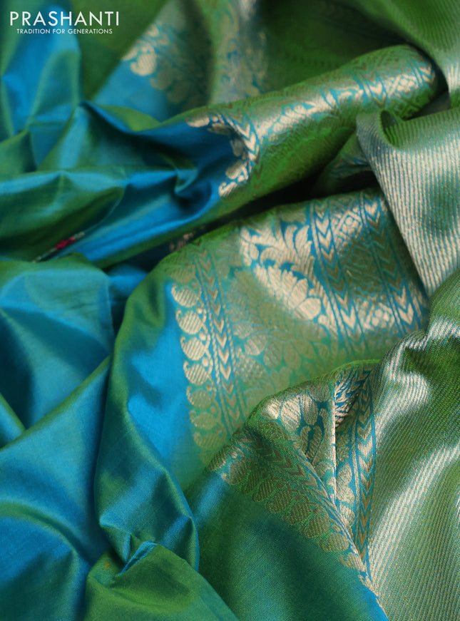 Banarasi katan silk saree dual shade of teal green and pink with zari woven floral buttas and simple border