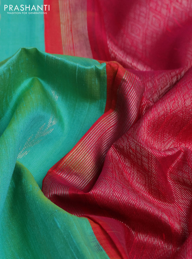 Pure raw silk saree dual shade of teal and reddish pink with allover silver zari weaves and small zari woven border