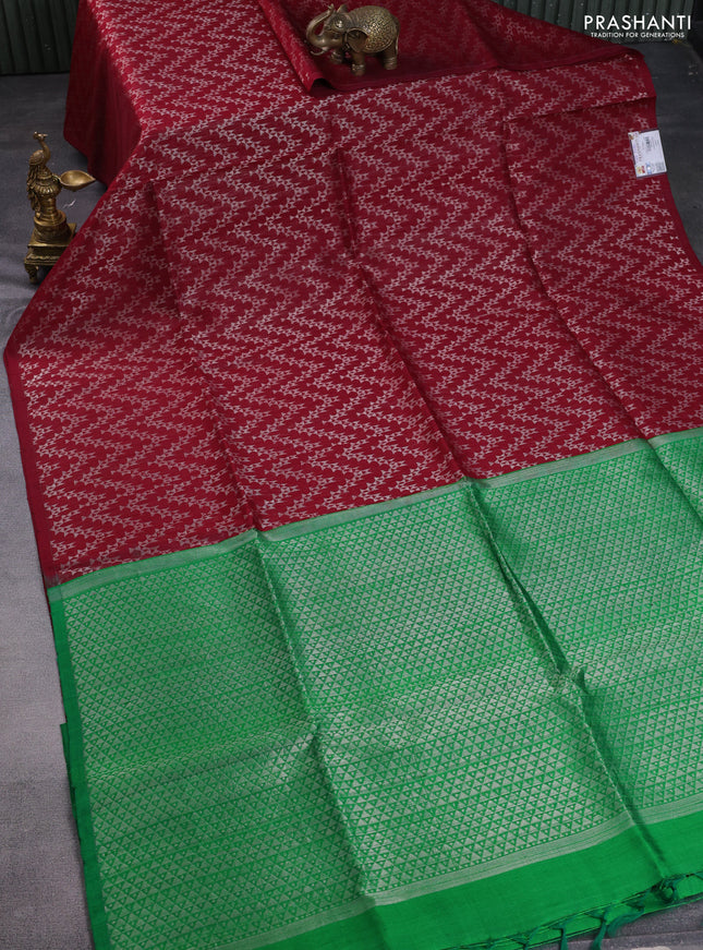 Pure raw silk saree maroon and green with allover silver zari weaves in borderless style
