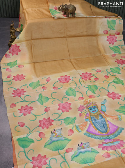 Pure tussar silk saree sandal and peach orange with plain body and pichwai hand painted pallu & border