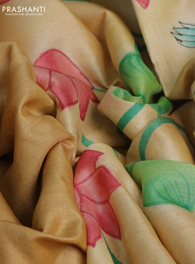 Pure tussar silk saree sandal and peach orange with plain body and pichwai hand painted pallu & border