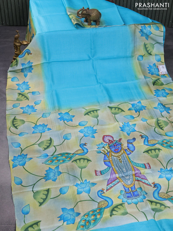 Pure tussar silk saree teal blue and pastel blue shade with plain body and pichwai hand painted pallu & border