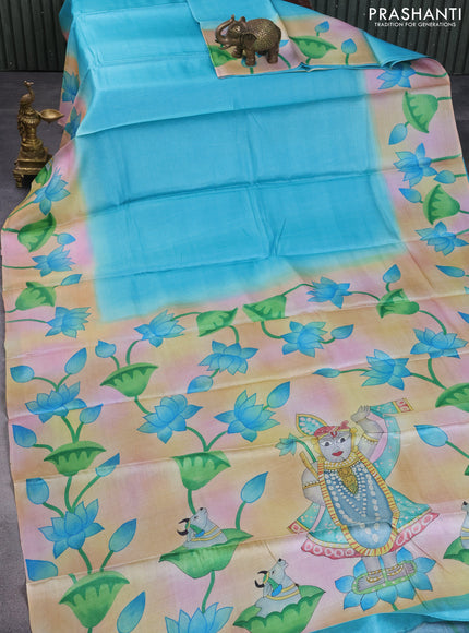 Pure tussar silk saree teal blue and pastel blue shade with plain body and pichwai hand painted pallu & border