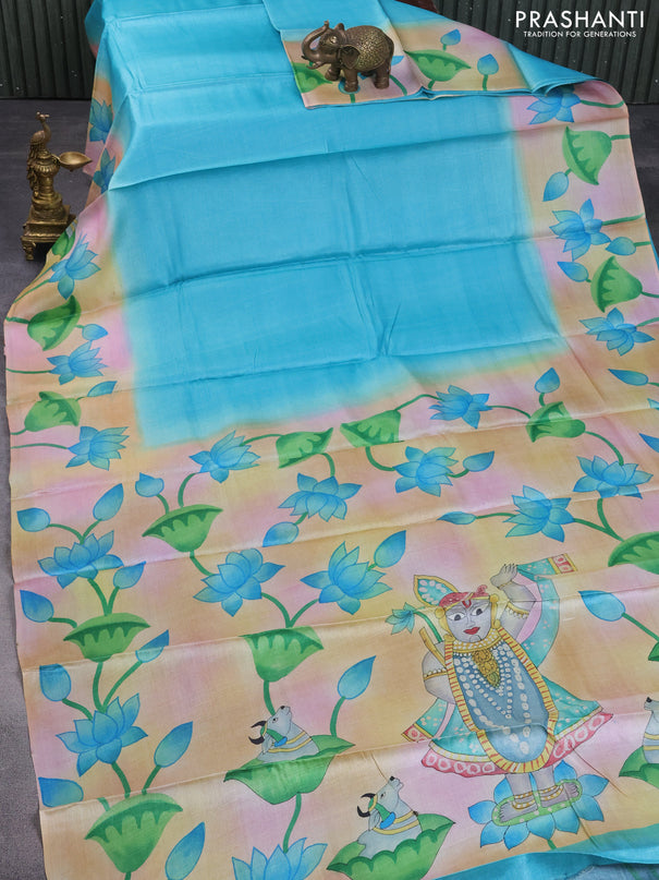 Pure tussar silk saree teal blue and pastel blue shade with plain body and pichwai hand painted pallu & border