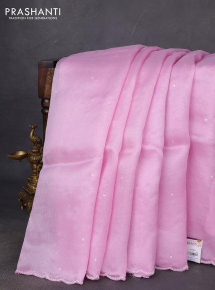Pure organza silk saree lotus pink with sequin buttas and beaded work border