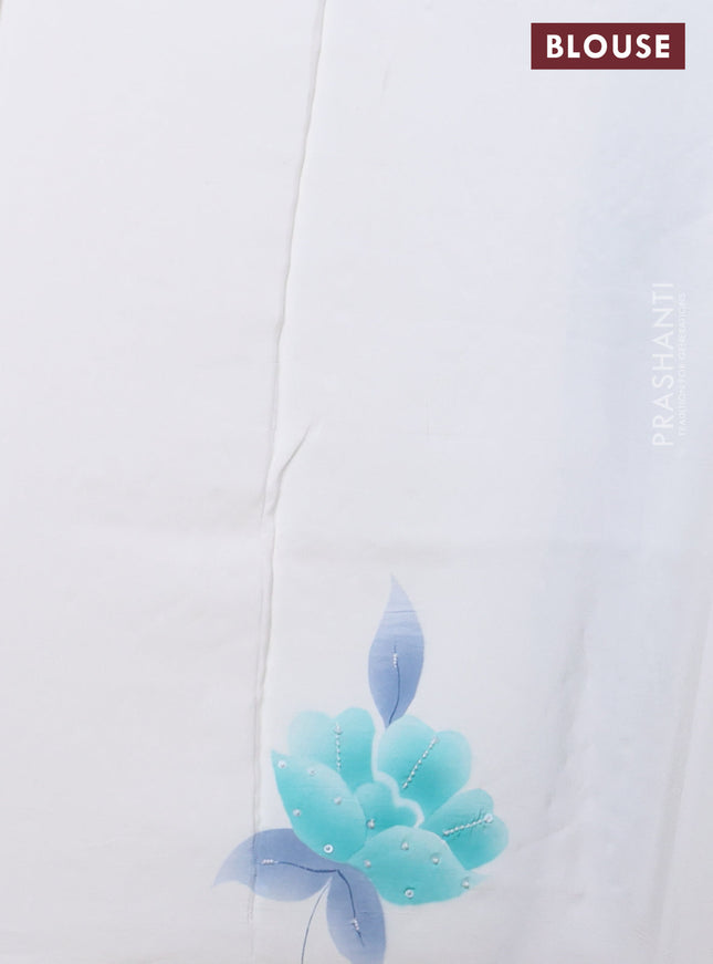 Pure organza silk saree cream with sequin buttas and beaded work border