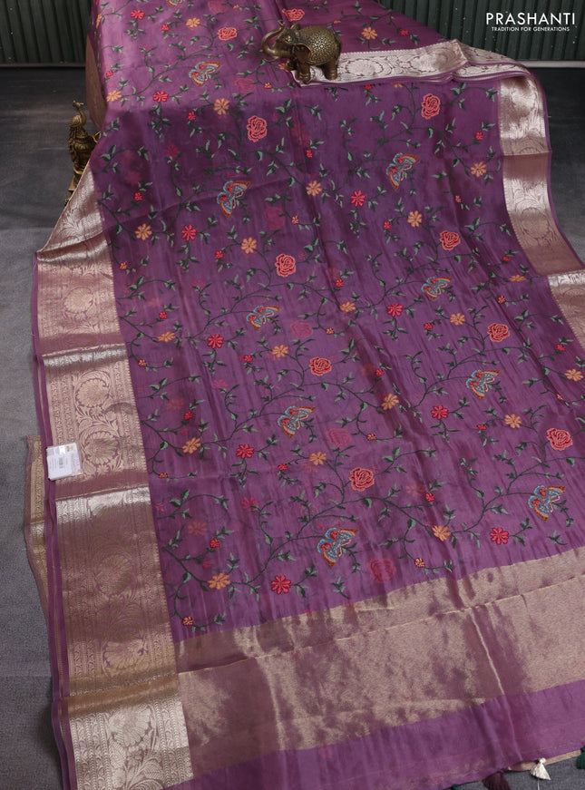 Pure organza silk saree wine shade with allover floral embroidery and long zari woven border