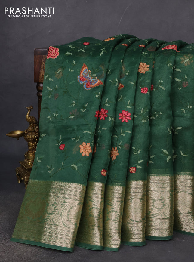 Pure organza silk saree green with allover floral embroidery and long zari woven border