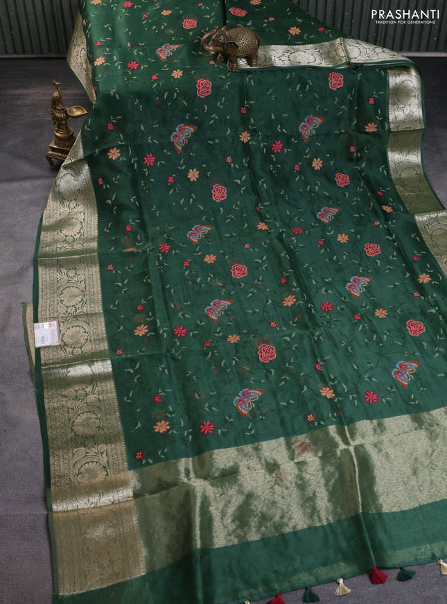 Pure organza silk saree green with allover floral embroidery and long zari woven border