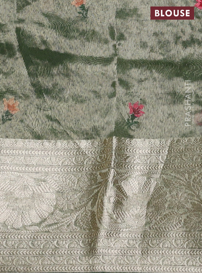 Pure organza silk saree green with allover floral embroidery and long zari woven border