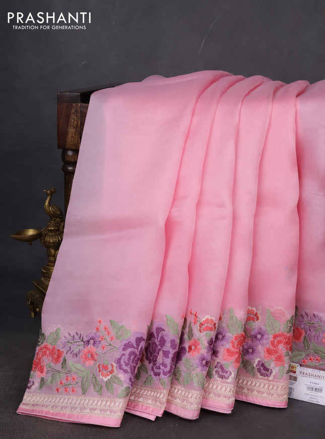 Pure organza silk saree light pink with plain body and floral embroidery border