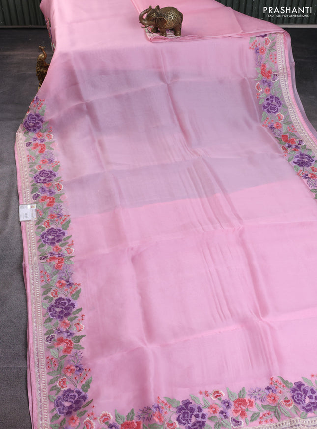 Pure organza silk saree light pink with plain body and floral embroidery border