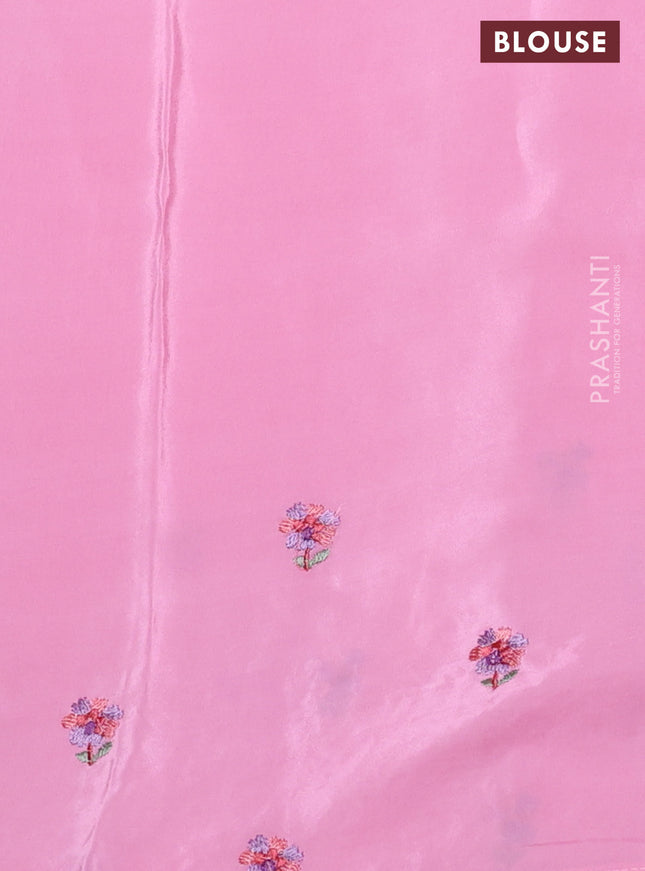 Pure organza silk saree light pink with plain body and floral embroidery border