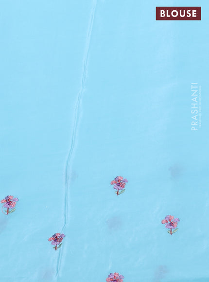 Pure organza silk saree light blue with plain body and floral embroidery border