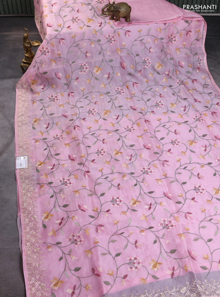 Pure organza silk saree light pink with allover embroidery and embroidery border