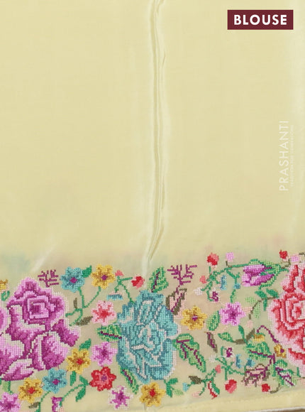 Pure organza silk saree pale yellow with embroidery buttas and petite embroidery border