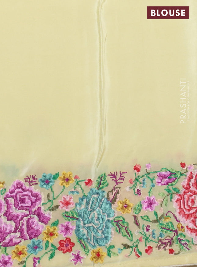 Pure organza silk saree pale yellow with embroidery buttas and petite embroidery border