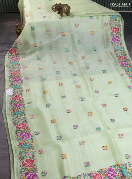 Pure organza silk saree pista green with embroidery buttas and petite embroidery border