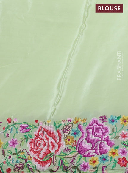 Pure organza silk saree pista green with embroidery buttas and petite embroidery border