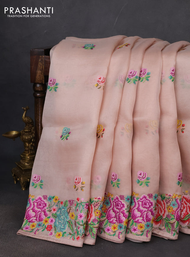 Pure organza silk saree beige with embroidery buttas and petite embroidery border