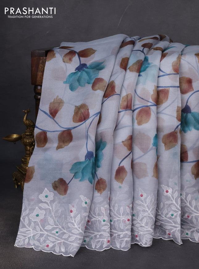 Pure organza silk saree greyish blue with allover floral hand painted prints and embroidery border