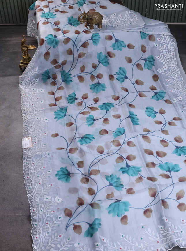 Pure organza silk saree greyish blue with allover floral hand painted prints and embroidery border