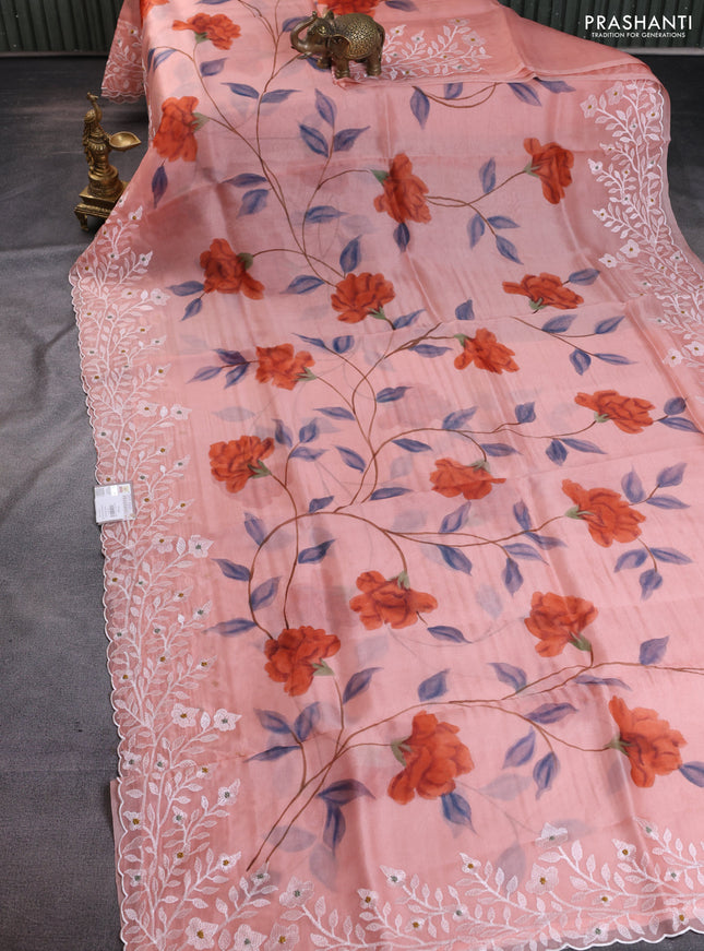 Pure organza silk saree peach shade with allover floral hand painted prints and embroidery border