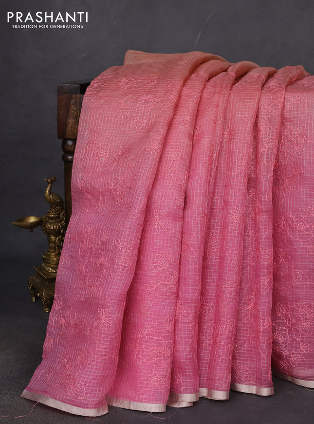 Organza silk saree peach orange and pink with allover zari checks & sequin embroidery and small zari woven border