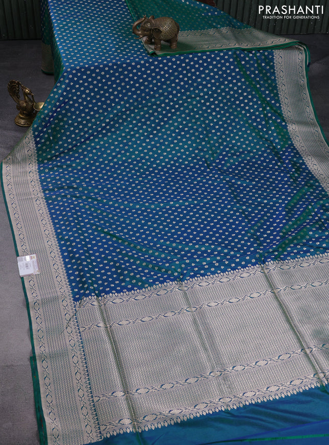 Pure banarasi uppada silk saree dual shade of bluish green with allover zari woven butta weaves and zari woven border