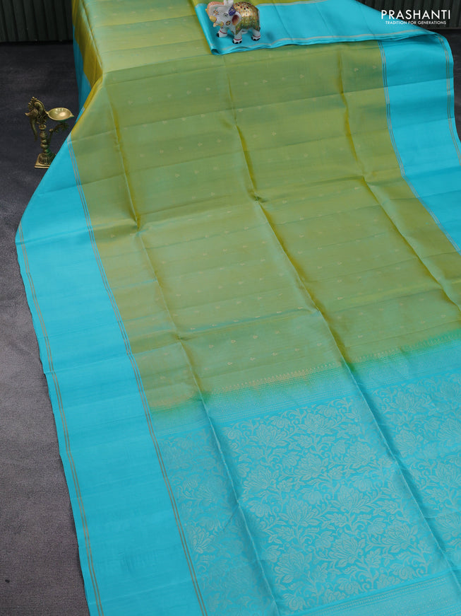 Pure soft silk saree light green and light blue with allover zari woven buttas and rettapet silver zari woven border