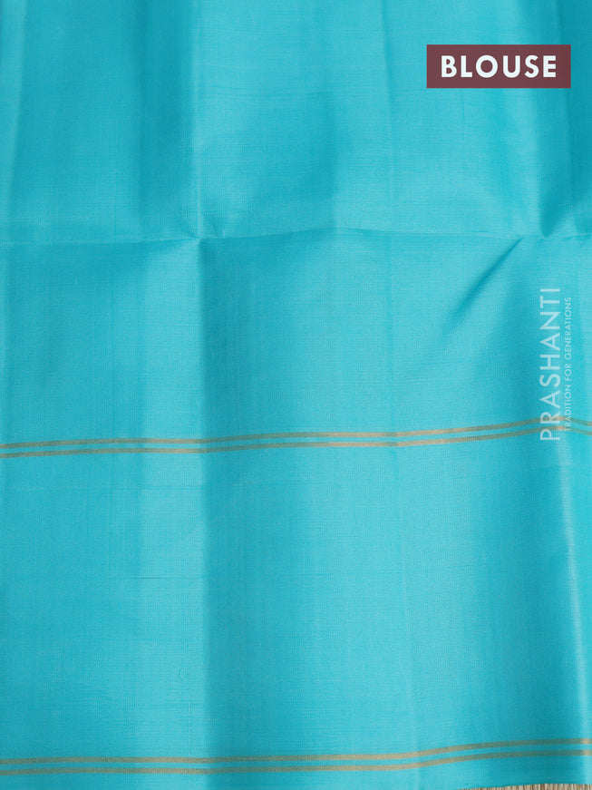 Pure soft silk saree light green and light blue with allover zari woven buttas and rettapet silver zari woven border