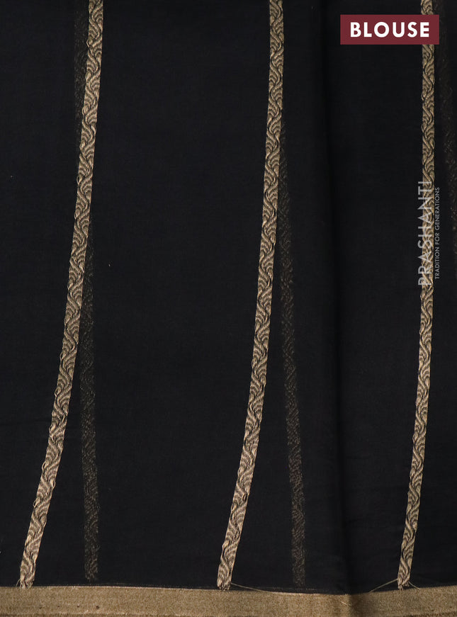 Banarasi organza silk saree black with silver & gold zari weaves and zari woven piping border