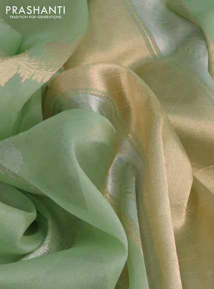Banarasi organza silk saree pastel green with silver & gold zari weaves and zari woven piping border
