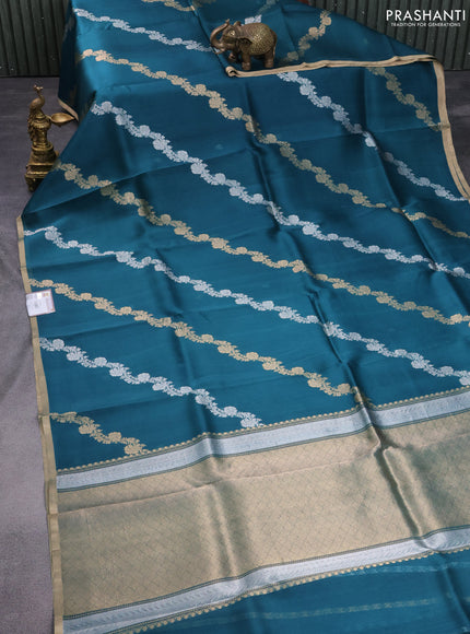 Banarasi organza silk saree peacock green with silver & gold zari weaves and zari woven piping border