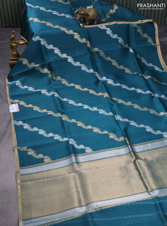 Banarasi organza silk saree peacock green with silver & gold zari weaves and zari woven piping border