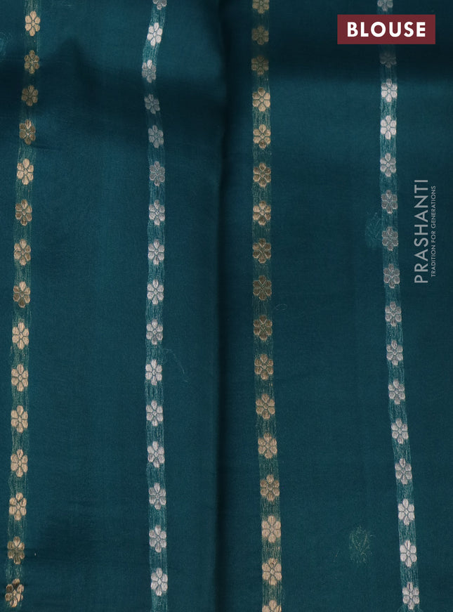 Banarasi organza silk saree peacock green with silver & gold zari weaves and zari woven piping border