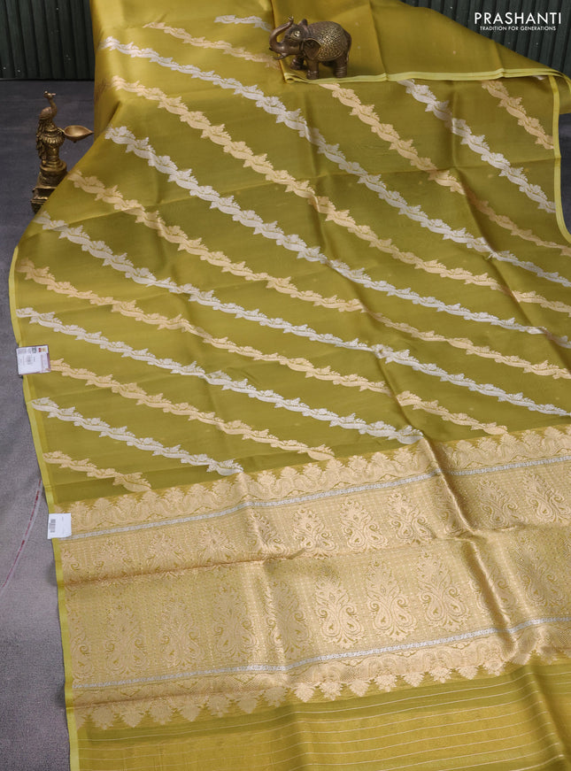 Banarasi organza silk saree mustard green with silver & gold zari weaves and piping border