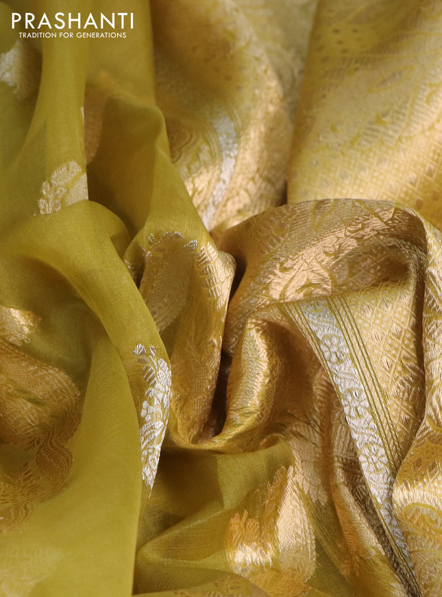 Banarasi organza silk saree mustard green with silver & gold zari weaves and piping border