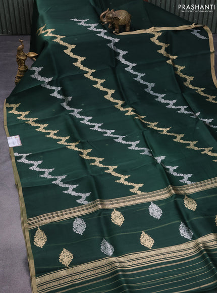 Banarasi organza silk saree bottle green with silver & gold zari weaves and zari woven piping border