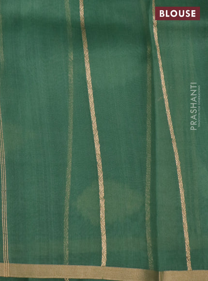 Banarasi organza silk saree pastel green with silver & gold zari weaves and zari woven piping border