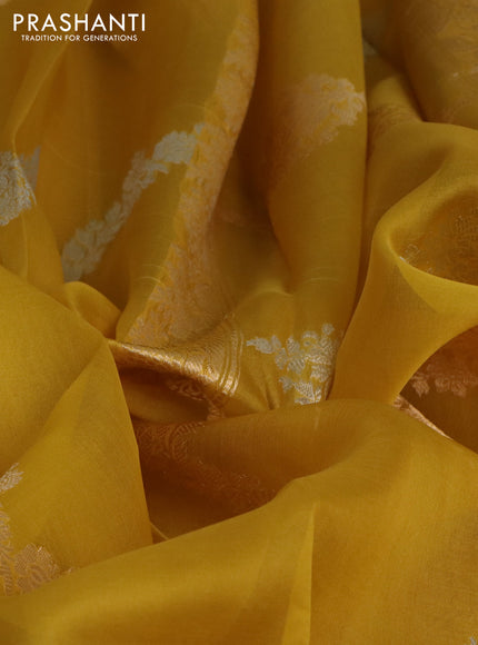 Banarasi organza silk saree mustard yellow with silver & gold zari weaves and zari woven piping border