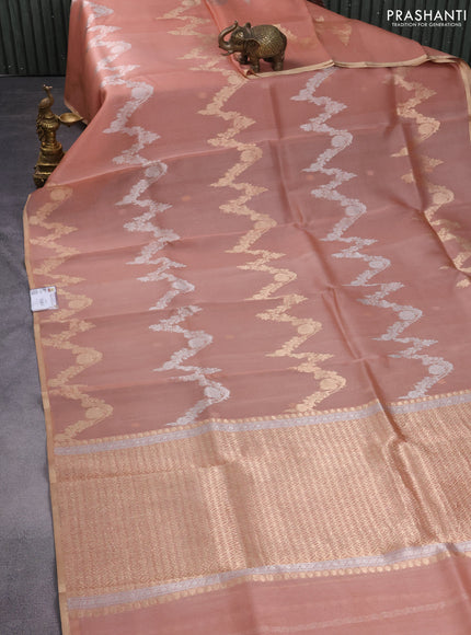 Banarasi organza silk saree pastel peach with allover silver & gold zari weaves and zari woven piping border