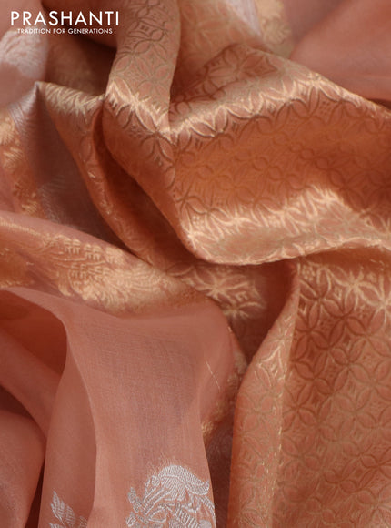 Banarasi organza silk saree pastel peach with allover silver & gold zari weaves and zari woven piping border