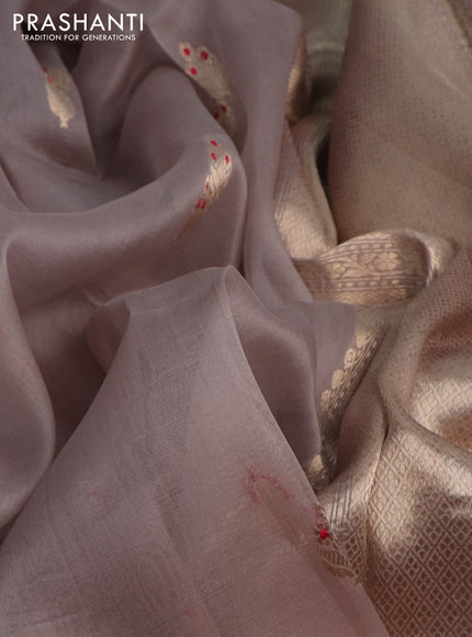Banarasi organza silk saree pastel grey with zari woven buttas and zari woven border