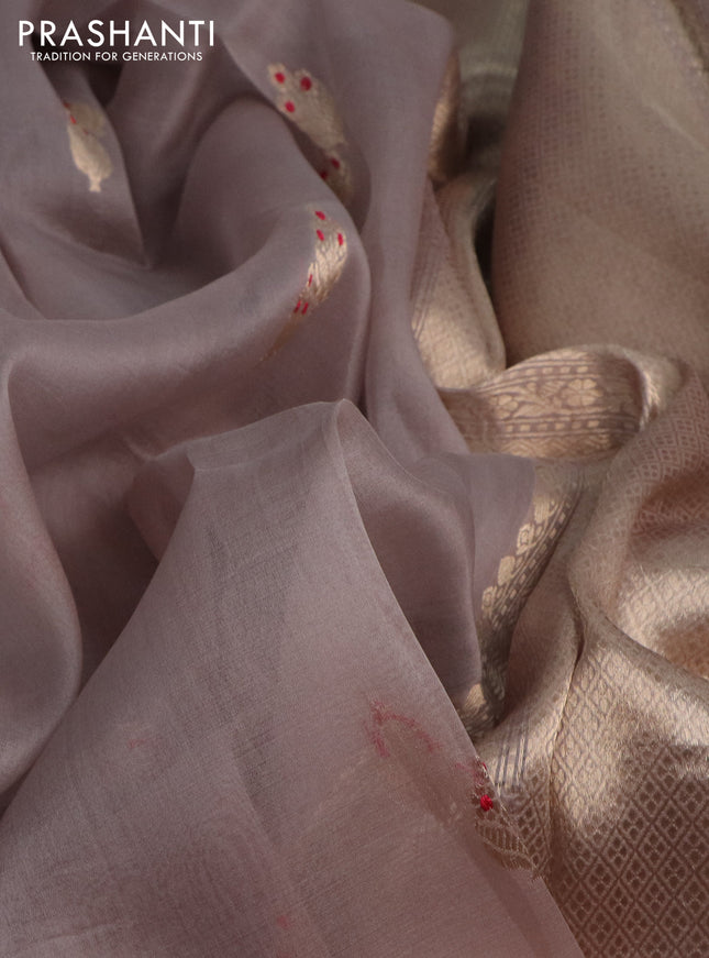 Banarasi organza silk saree pastel grey with zari woven buttas and zari woven border