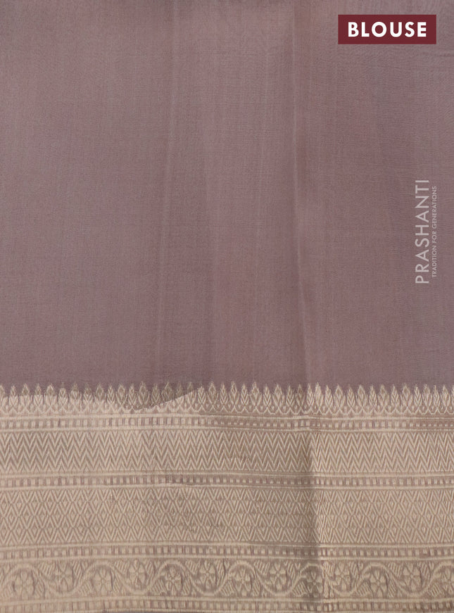 Banarasi organza silk saree pastel grey with zari woven buttas and zari woven border