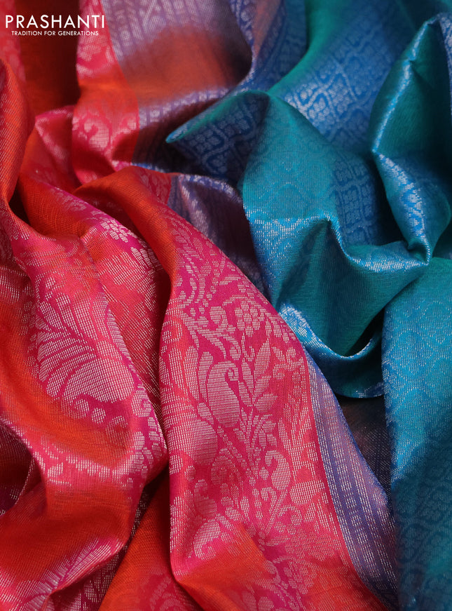 Pure soft silk saree dual shade of pinkish orange and teal blue with allover silver zari woven brocade weaves and zari woven border
